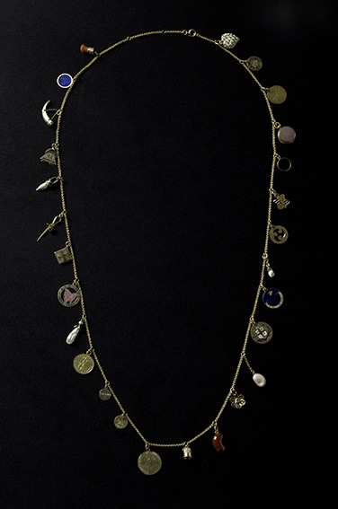 Assembled by Marion Oak Sticht (1864-1924), Necklace and charm pendants, c. 1900-1914. Purchased with the assistance of the TMAG Foundation Ltd. 2018, Tasmanian Museum and Art Gallery